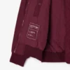 Dámská oversized bomber bunda s žebrovanými manžetami Dámská oversized bomber bunda s žebrovanými manžetami