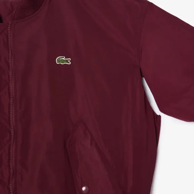 Dámská oversized bomber bunda s žebrovanými manžetami Dámská oversized bomber bunda s žebrovanými manžetami
