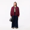 Dámská oversized bomber bunda s žebrovanými manžetami Dámská oversized bomber bunda s žebrovanými manžetami