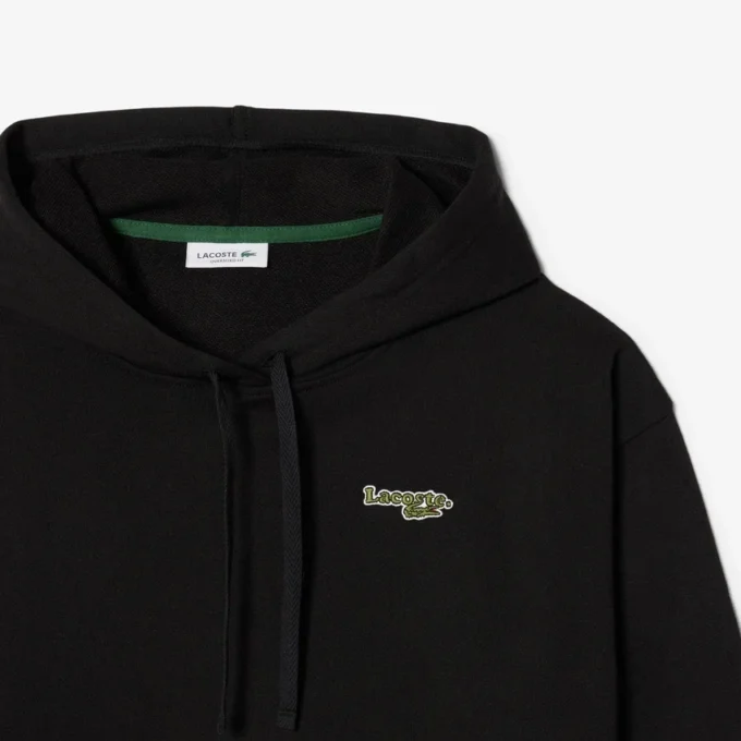 Dámská oversized mikina s kapucí a logem Dámská oversized mikina s kapucí a logem