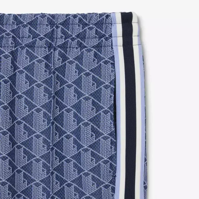 Dámské rozšiřující se tepláky s monogramem Dámské rozšiřující se tepláky s monogramem