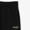 Dámské tepláky s logem a rovným střihem Dámské tepláky s logem a rovným střihem