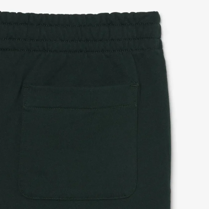 Dámské tepláky s logem a rovným střihem Dámské tepláky s logem a rovným střihem