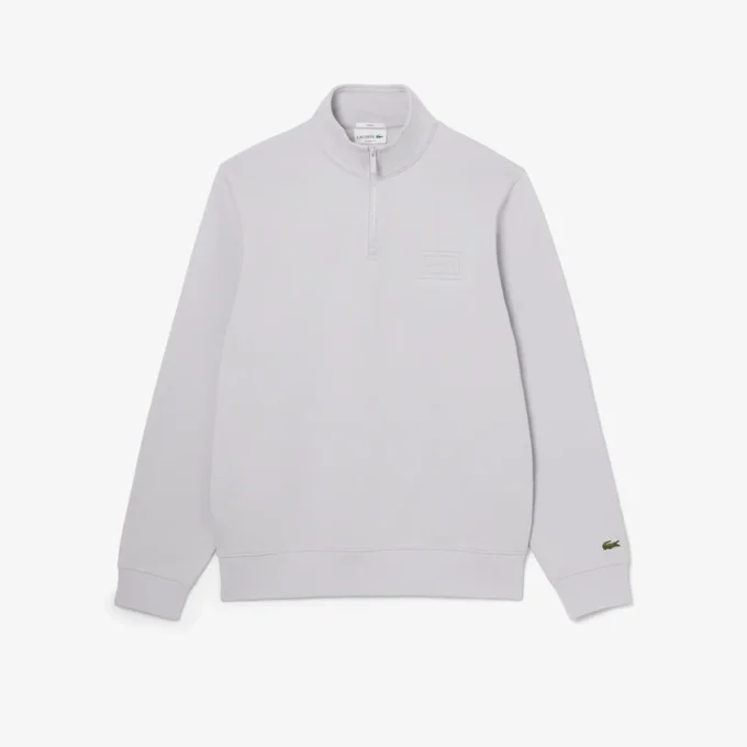 Mikina s vysokým límcem a reliéfním potiskem na zip Mikina s vysokým límcem a reliéfním potiskem na zip