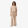 Oversized saténové kalhoty s elastickým pasem Oversized saténové kalhoty s elastickým pasem