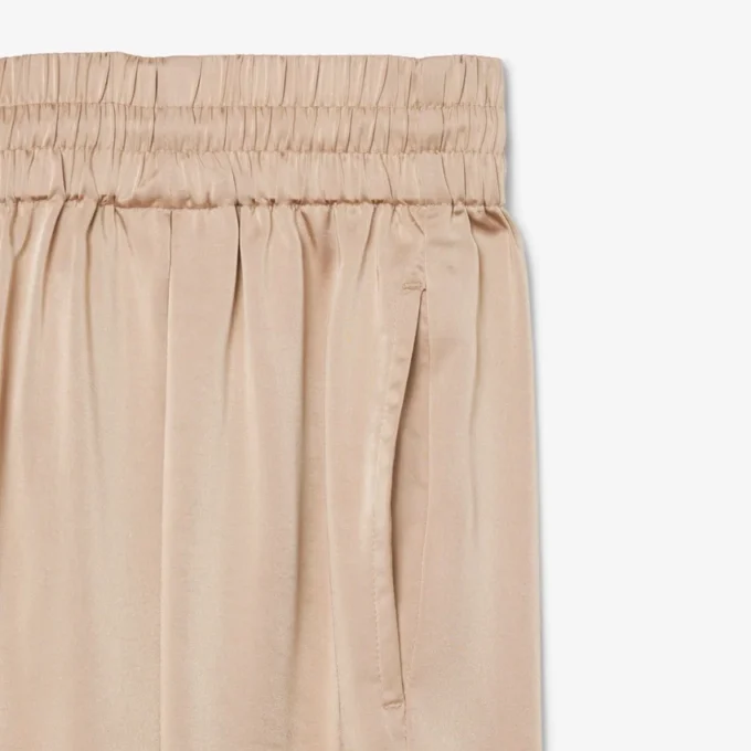 Oversized saténové kalhoty s elastickým pasem Oversized saténové kalhoty s elastickým pasem