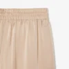 Oversized saténové kalhoty s elastickým pasem Oversized saténové kalhoty s elastickým pasem