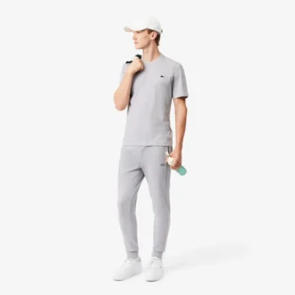 Pánské tepláky ze strečového úpletu se slim fit střihem
