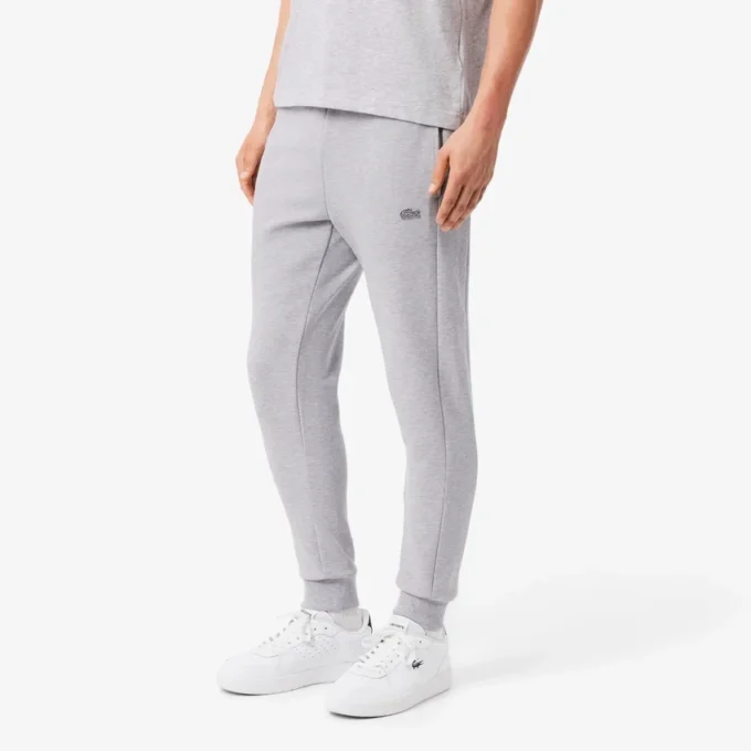 Pánské tepláky ze strečového úpletu se slim fit střihem Pánské tepláky ze strečového úpletu se slim fit střihem