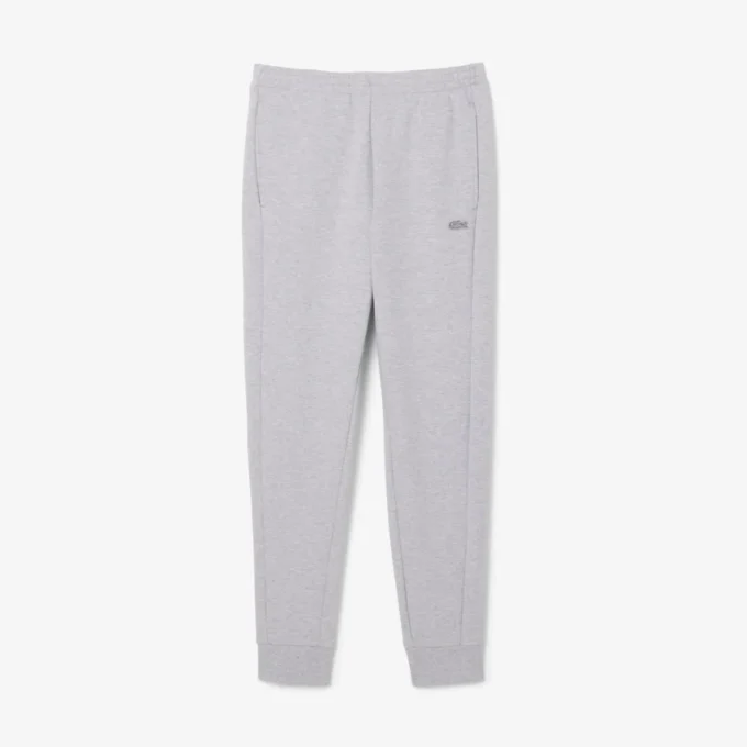Pánské tepláky ze strečového úpletu se slim fit střihem Pánské tepláky ze strečového úpletu se slim fit střihem