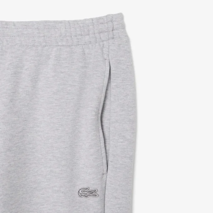Pánské tepláky ze strečového úpletu se slim fit střihem Pánské tepláky ze strečového úpletu se slim fit střihem