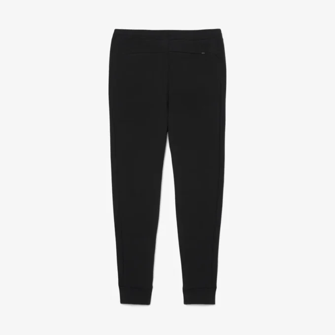 Pánské tepláky ze strečového úpletu se slim fit střihem Pánské tepláky ze strečového úpletu se slim fit střihem