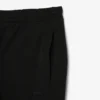 Pánské tepláky ze strečového úpletu se slim fit střihem Pánské tepláky ze strečového úpletu se slim fit střihem