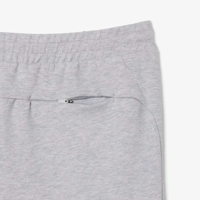 Pánské tepláky ze strečového úpletu se slim fit střihem Pánské tepláky ze strečového úpletu se slim fit střihem