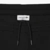 Pánské tepláky ze strečového úpletu se slim fit střihem Pánské tepláky ze strečového úpletu se slim fit střihem