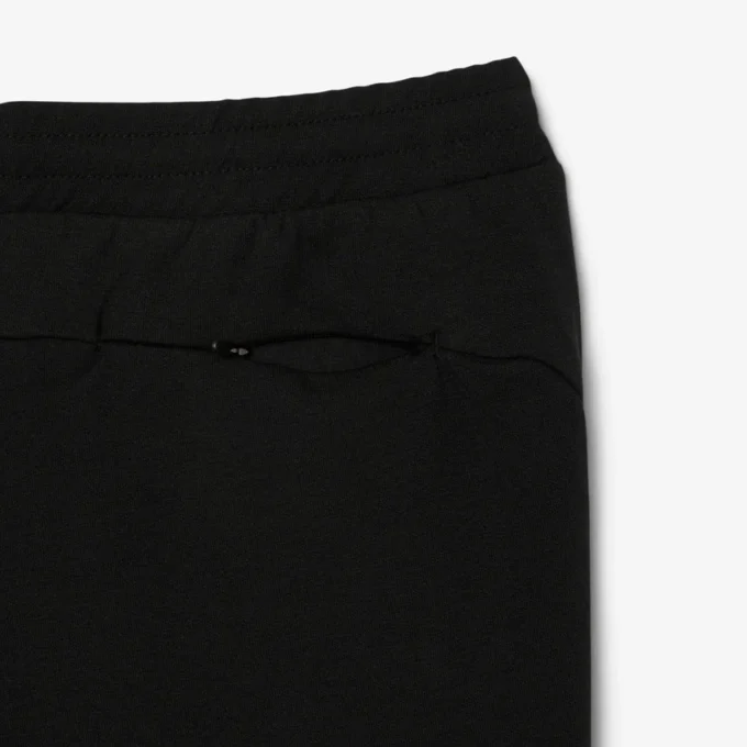 Pánské tepláky ze strečového úpletu se slim fit střihem Pánské tepláky ze strečového úpletu se slim fit střihem