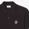 Polo tričko s klasickým střihem a nášivkou Polo tričko s klasickým střihem a nášivkou