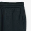 Saténové joggery z kolekce Runway