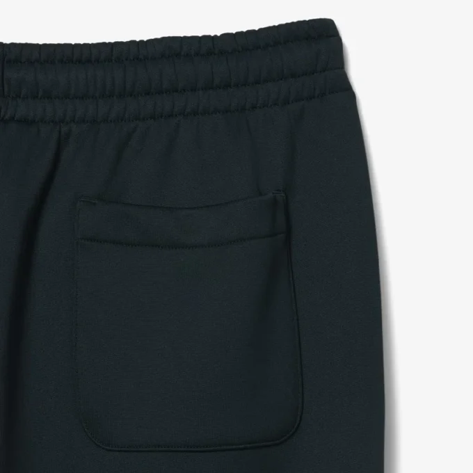 Saténové joggery z kolekce Runway