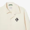 Vyrobeno ve Francii Bunda s retro nášivkou Vyrobeno ve Francii Bunda s retro nášivkou